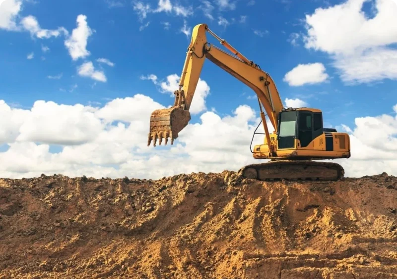 Heavy machinery operating in open field